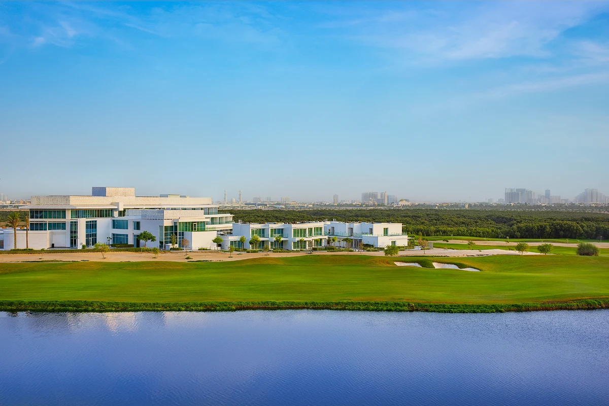 Resort rooms overlooking serene mangrove forest and coastal landscape.